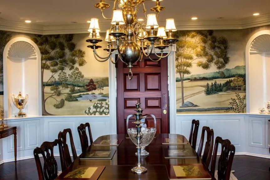 Luxury home: dining room table and chandelier