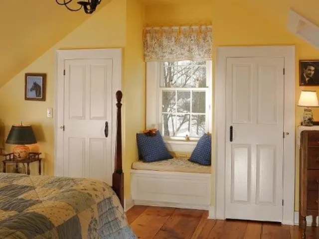 Historic renovation: primary bedroom after restoration