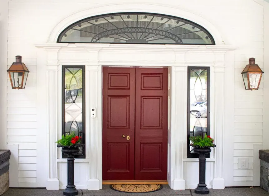 Luxury home: reclaimed Calvin Coolidge door before restoration